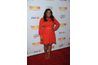 Amber Riley's simple A-line dress flatters her natural curves.